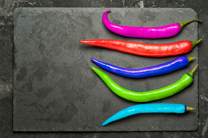 four brightly colored peppers illustrate unique personality types